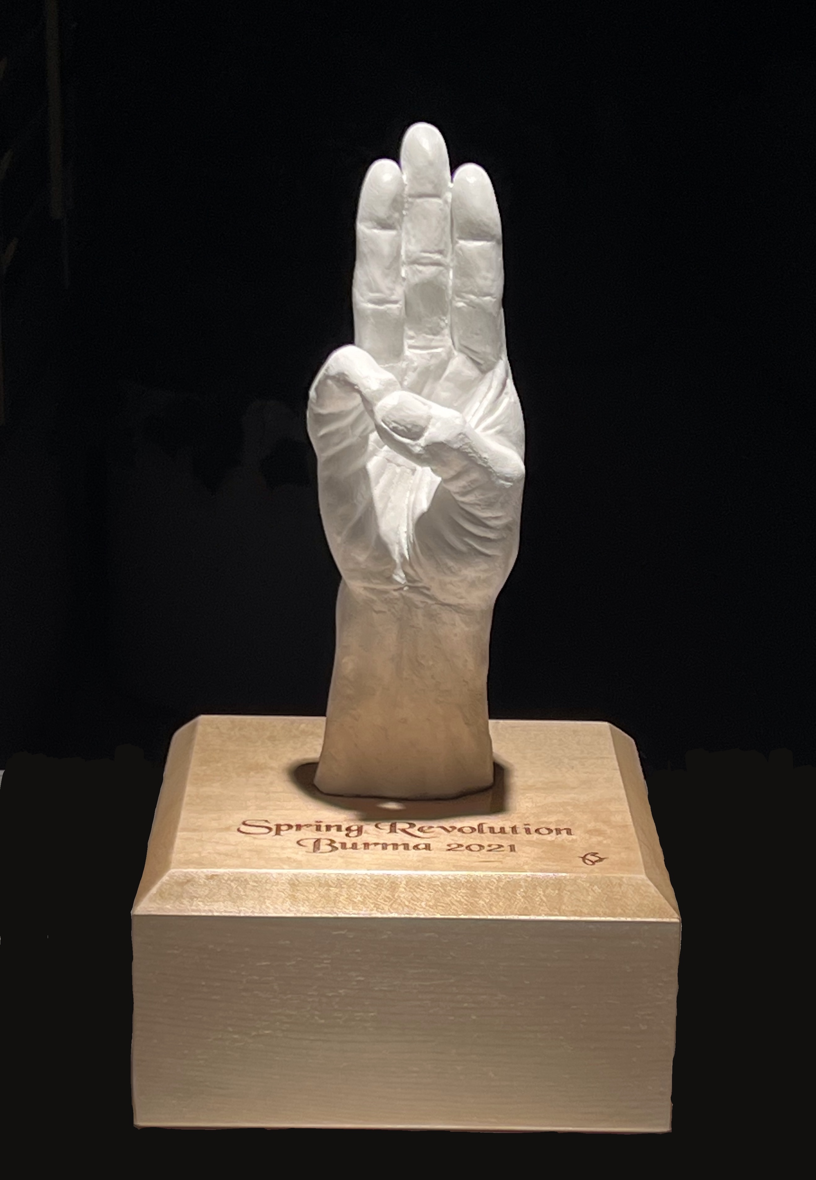 Another view of the upright hand sculpture